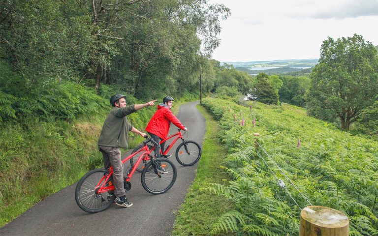two people on a guided bike tour near loch lomond