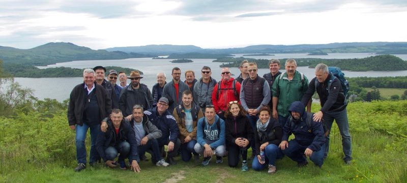 a group on a guided hike over looking loch lomond