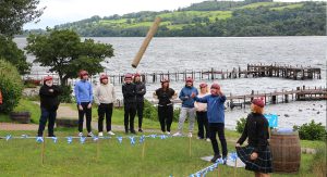 Corporate Island Fun Day Caber toss