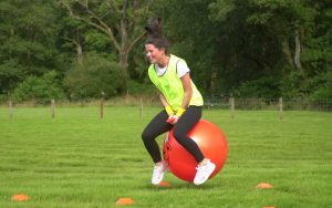 A Woman on a space hopper at a hen party